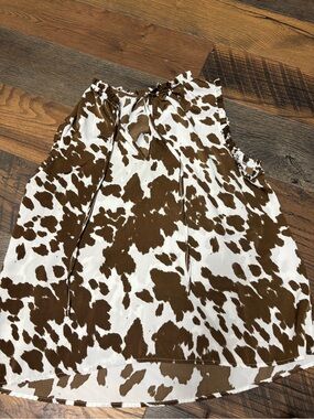 Tyche Brown and White Cow-Pattern Tie Neck Blouse